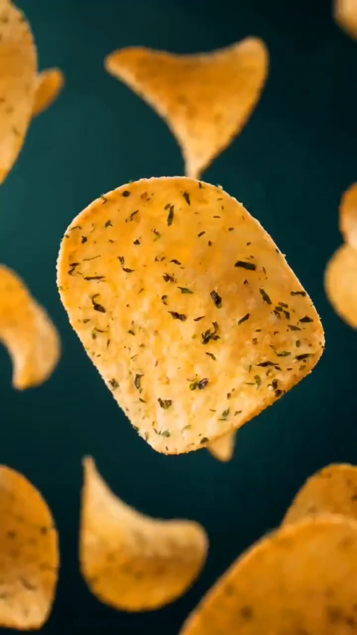 Crispy Chip Soars Through Swirling Nori Waves in Macro