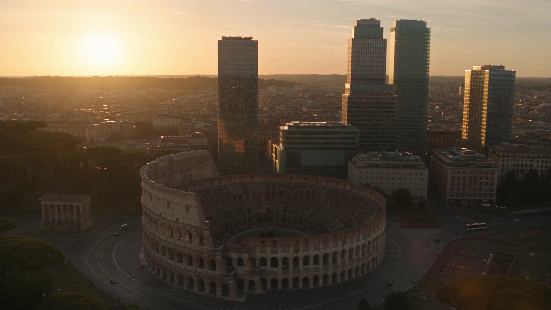Eternal Colosseum Hosts Crowds as Electric Cars Circle Ancient Arches