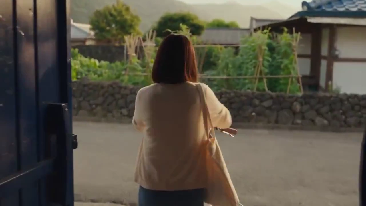 Warm Summer Evening Unfolds as Korean Family Cycles Village Roads