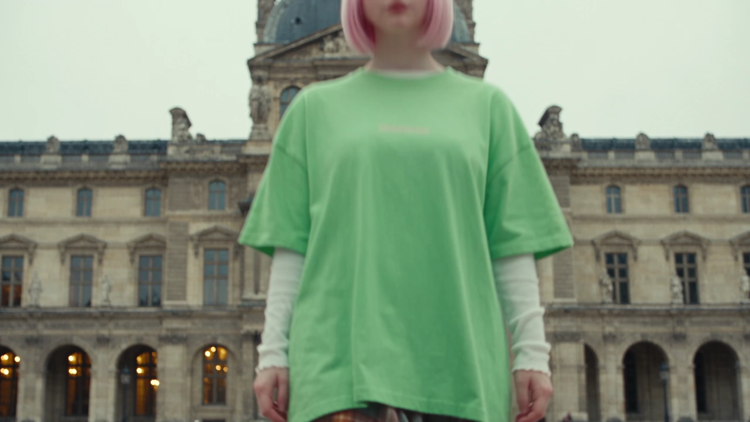 Fashion Muse Glides Past Arched Windows in Melancholic Urban Daydream