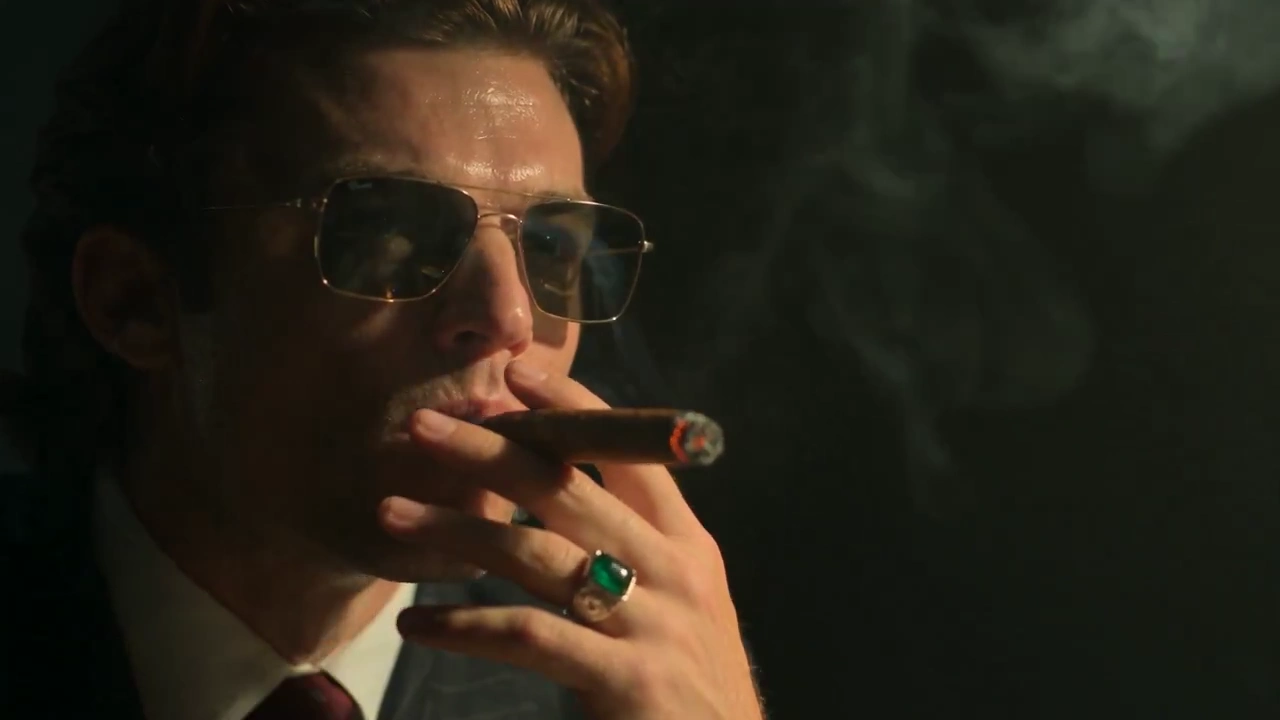 Cigar Smoke Drifts as a Silent Man Awaits a Hesitant Answer