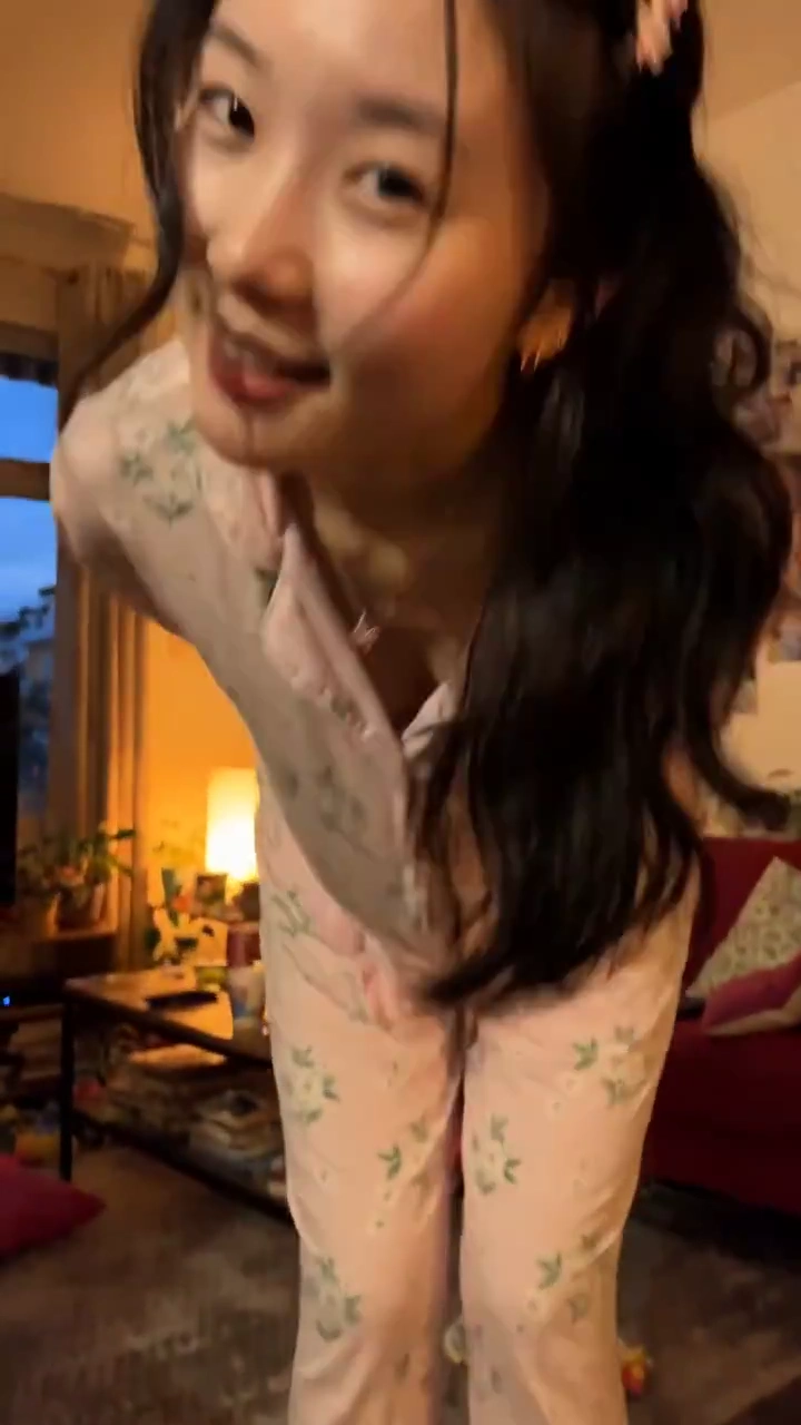 Handheld POV Captures A Tender Living Room Waltz At Dusk