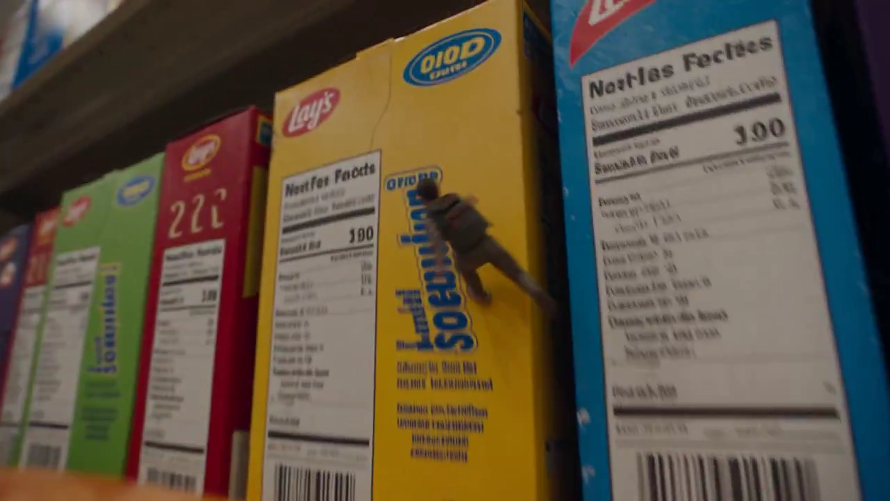 Tiny Athlete Races Through Supermarket on Rolling Candies