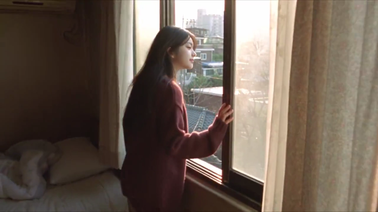 Candid MiniDV Moment: A Feather Floats Into Her Palm