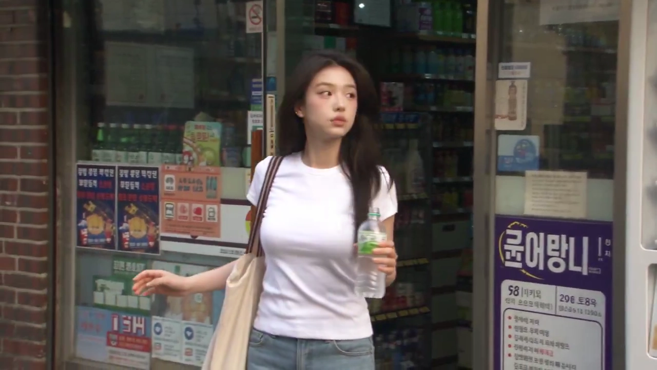 Young Woman Explores Old Seoul Neighborhood With Playful Cat Encounter