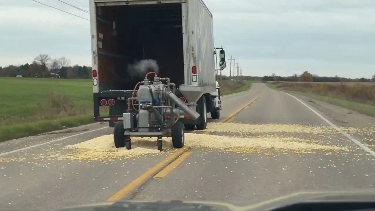 Highway Popcorn Machine Erupts Sending Red-Hooded Woman Airborne