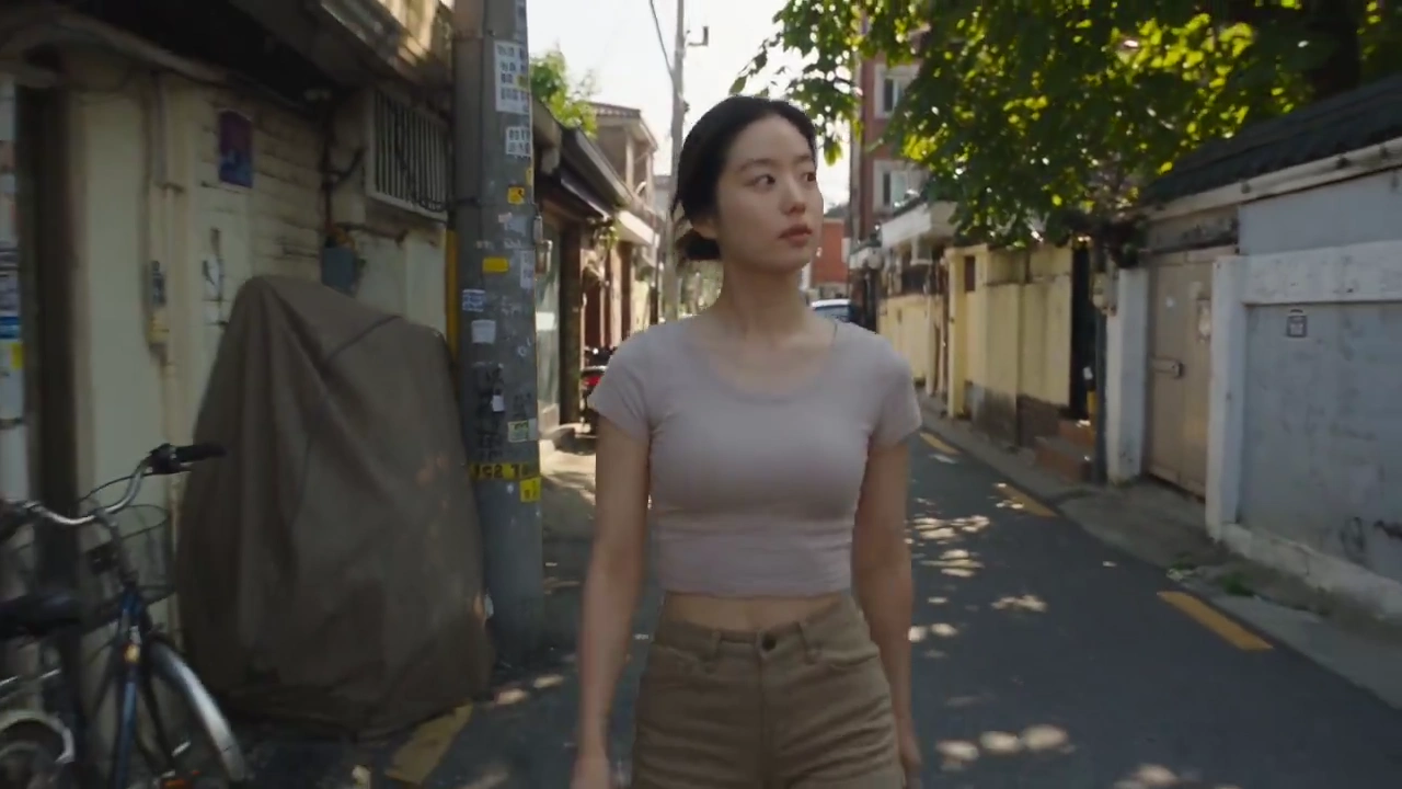 Playful Korean Girl Leads Viewer Through Warm Alley Food Moment