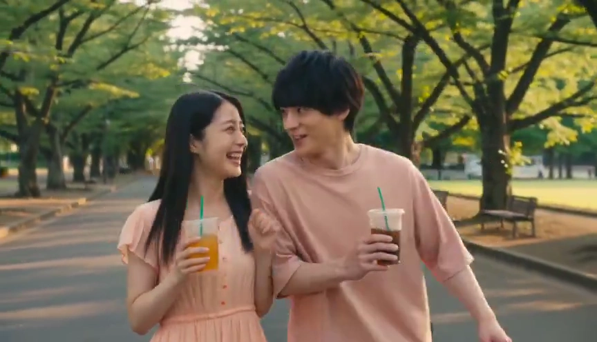 Two Lovers Chase and Spin in Pastel Outfits Before Breaking Character
