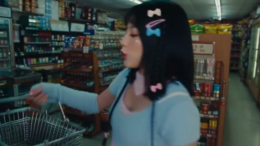 Woman Documents Chaotic Snack Haul in Early 2000s MiniDV Style Vlog