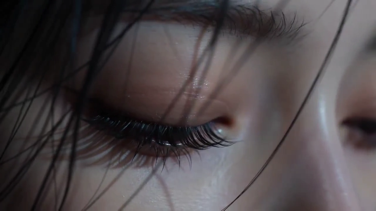 Extreme Close-Up Reveals Porcelain Skin and Expressive Brown Irises