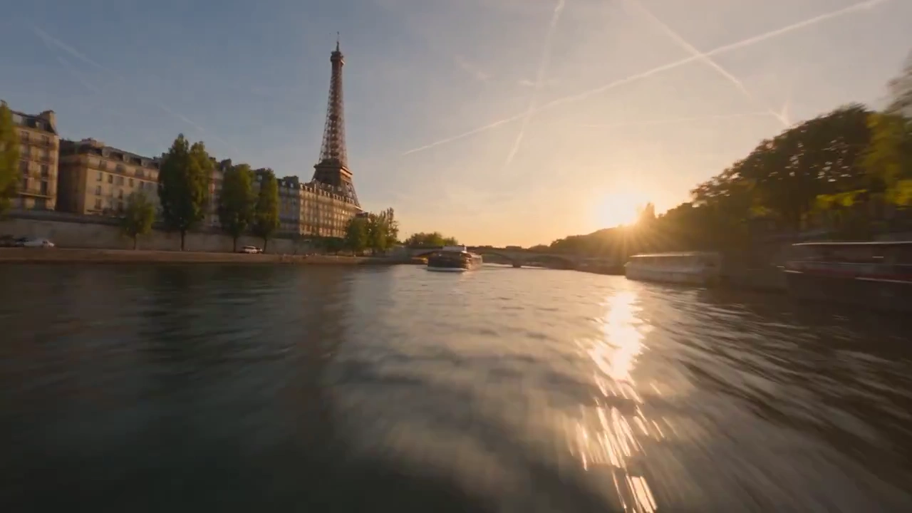 Sunset Aerial Sweeps Past Boats and Bridges Toward Paris Iron Lady