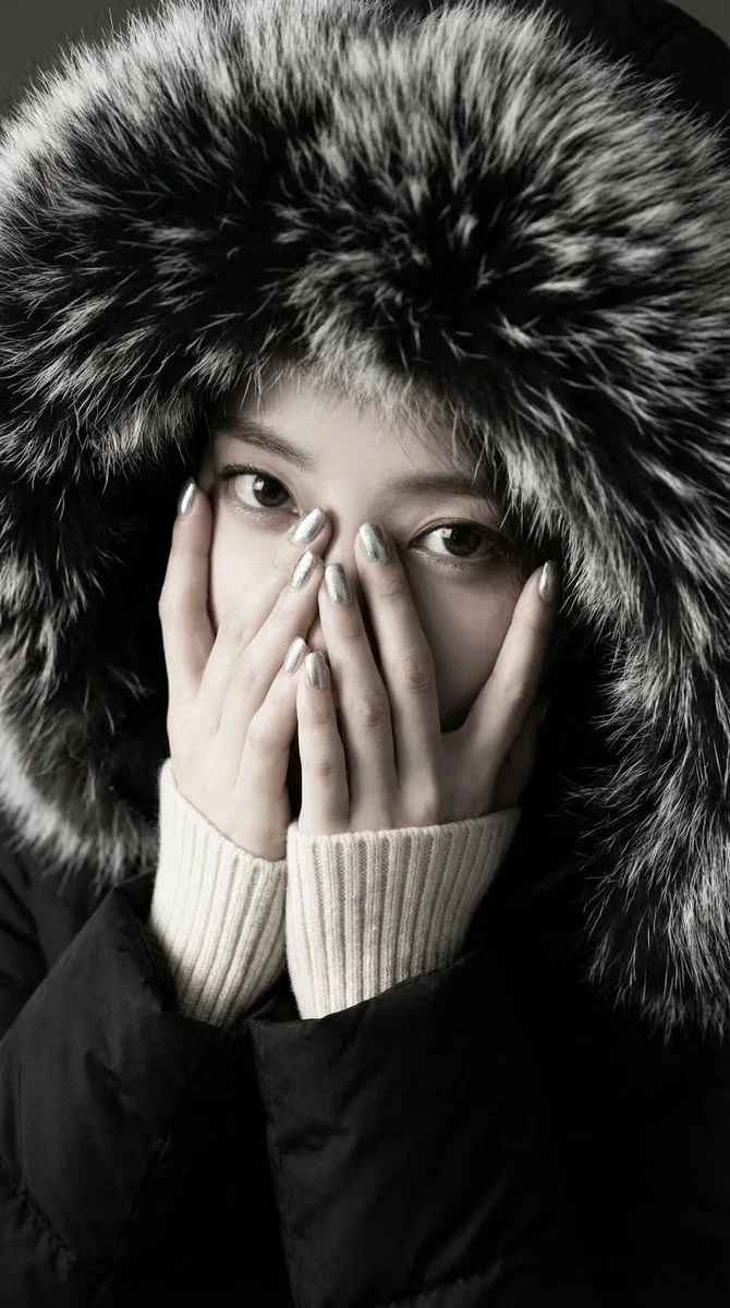 Doe-Eyed Winter Gaze Above the Fur Cocoon