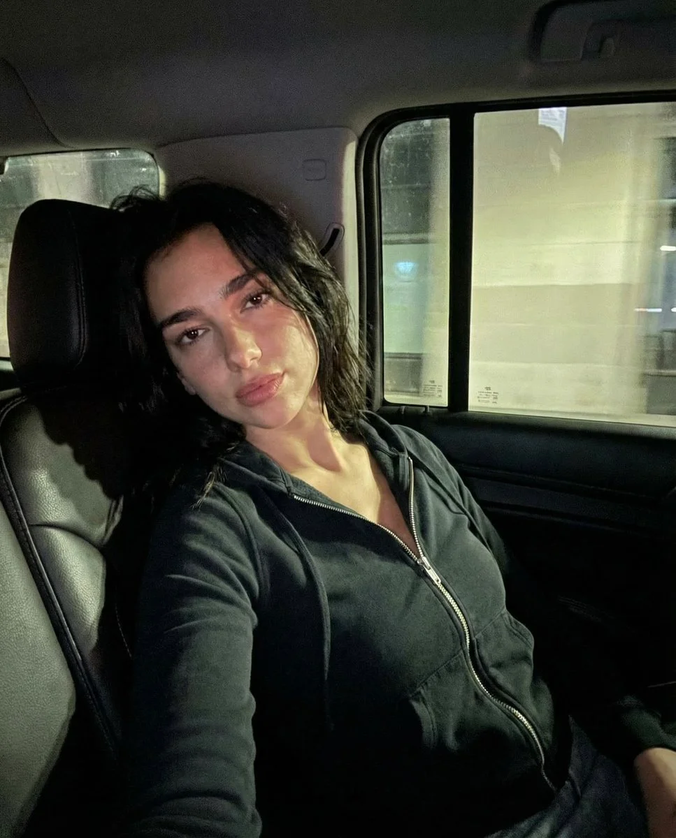 Dua Lipa's Raw Nighttime Selfie in Subtle Car Glow