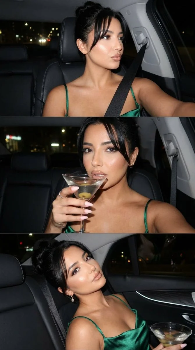 Emerald satin dress shines in night car selfie flash