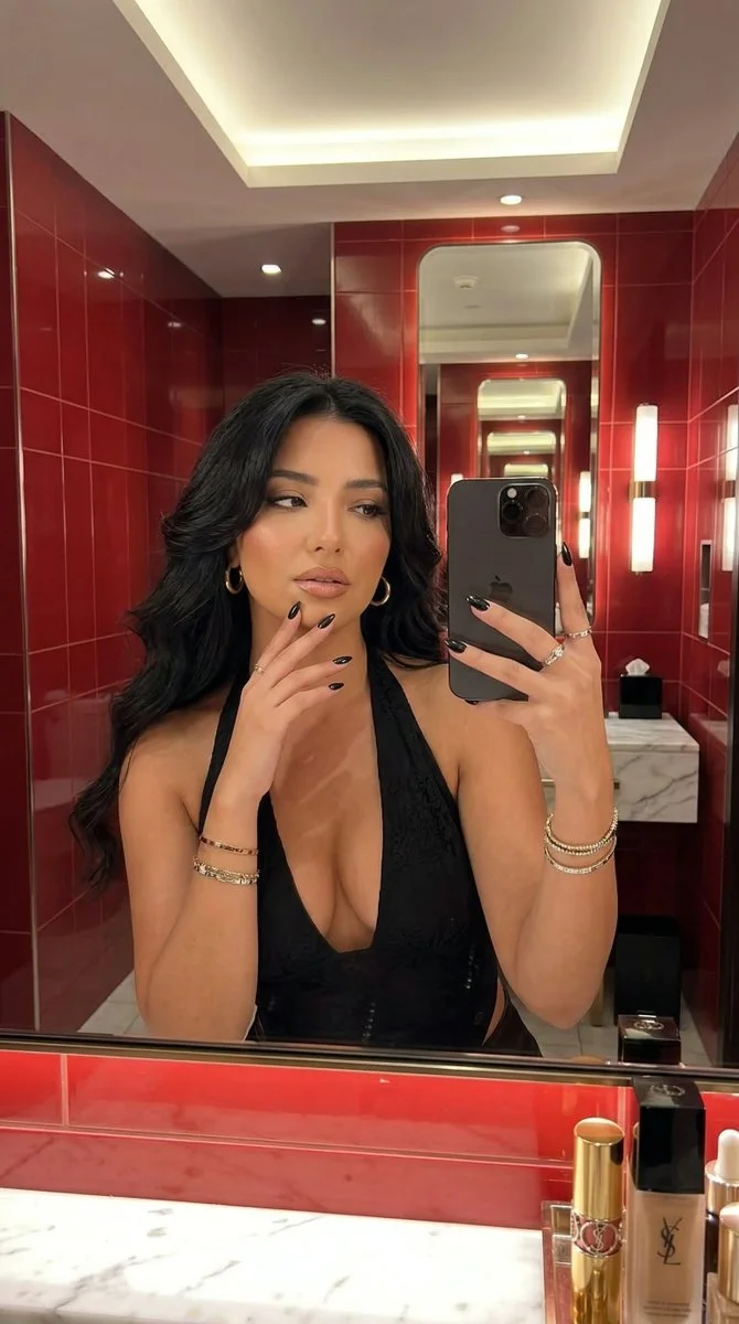 Glamorous Red Reflections: A Mirror Selfie Masterpiece