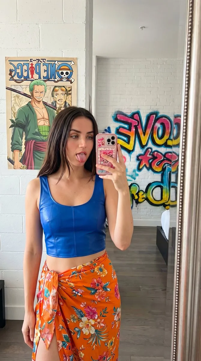 Glamorous Urban Selfie with Emerald Flair and Bold Graffiti