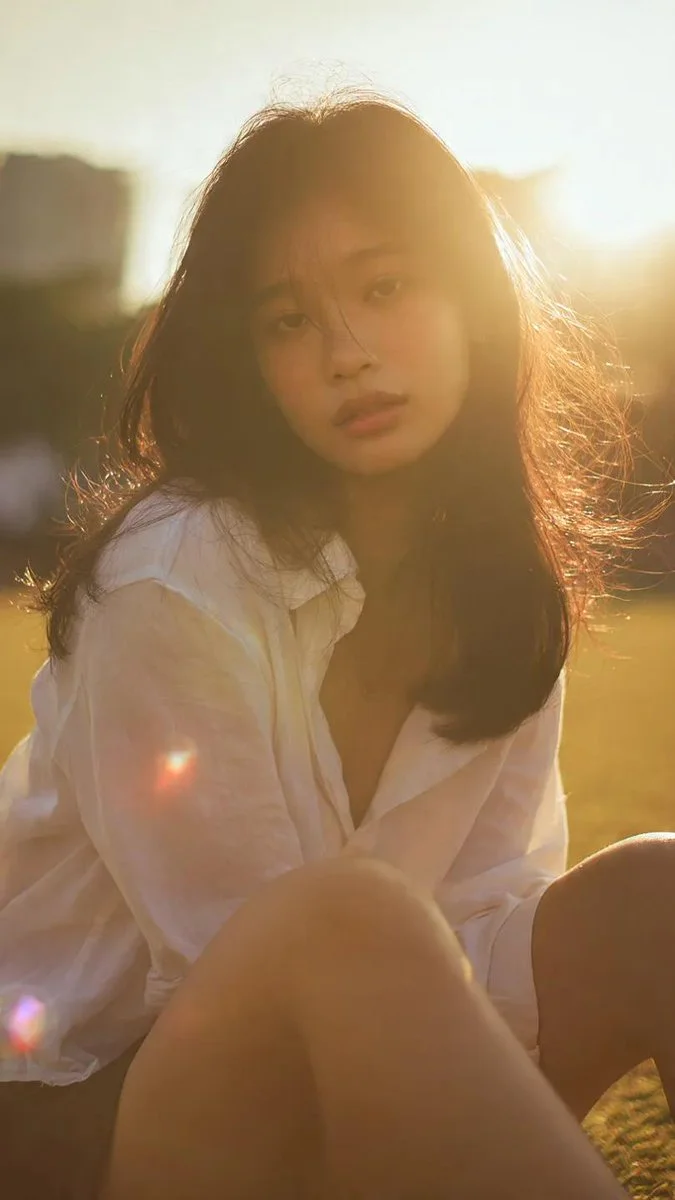 Golden Hour Serenity: Cinematic Portrait with Warm Halo Light