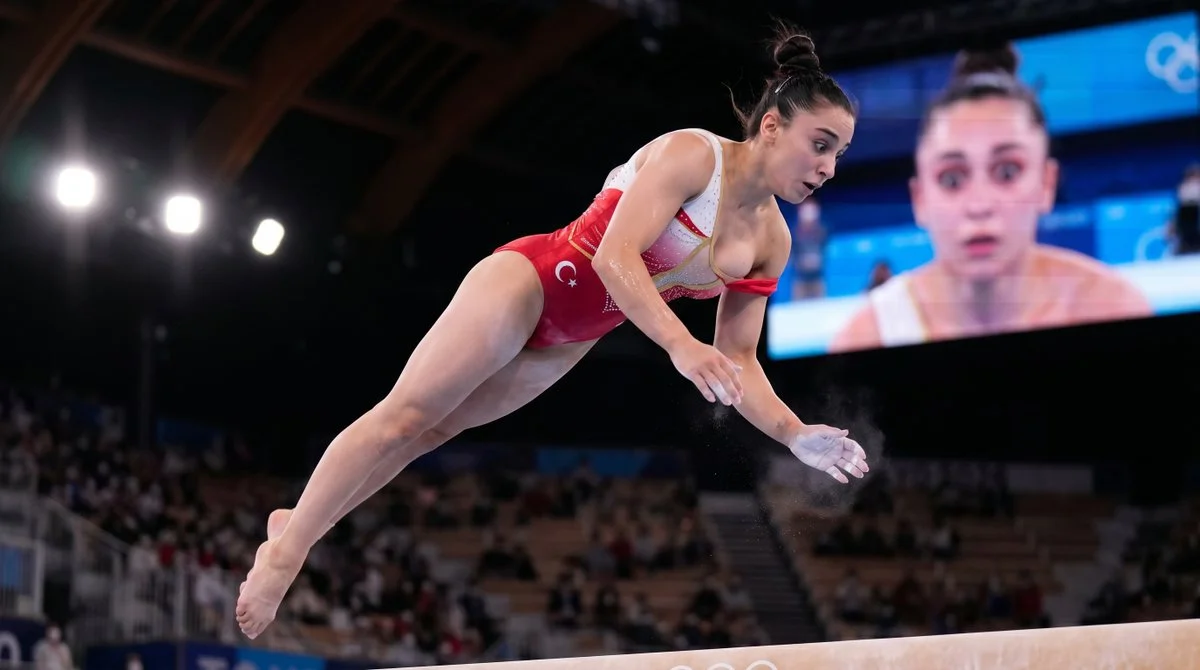 Gymnast's leotard strap snaps mid-routine at Olympic final
