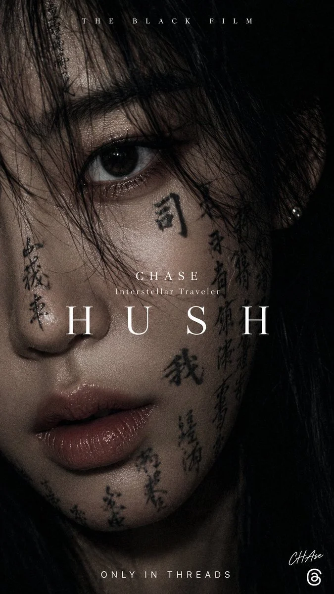 Ink-marked face with glossy lips emerges from shadowy darkness