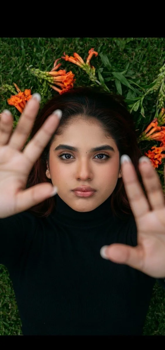 Intimate Portrait Amidst Vibrant Nature’s Embrace