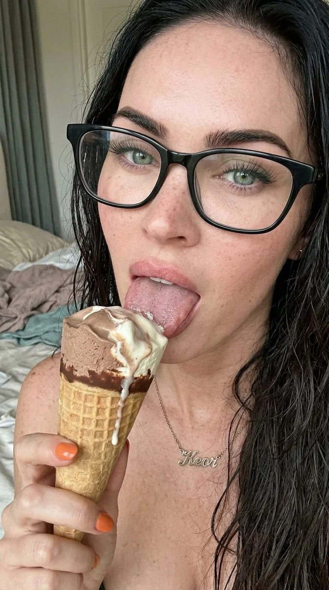 Intimate Portrait of a Woman Savoring Ice Cream in Soft Ambient Light