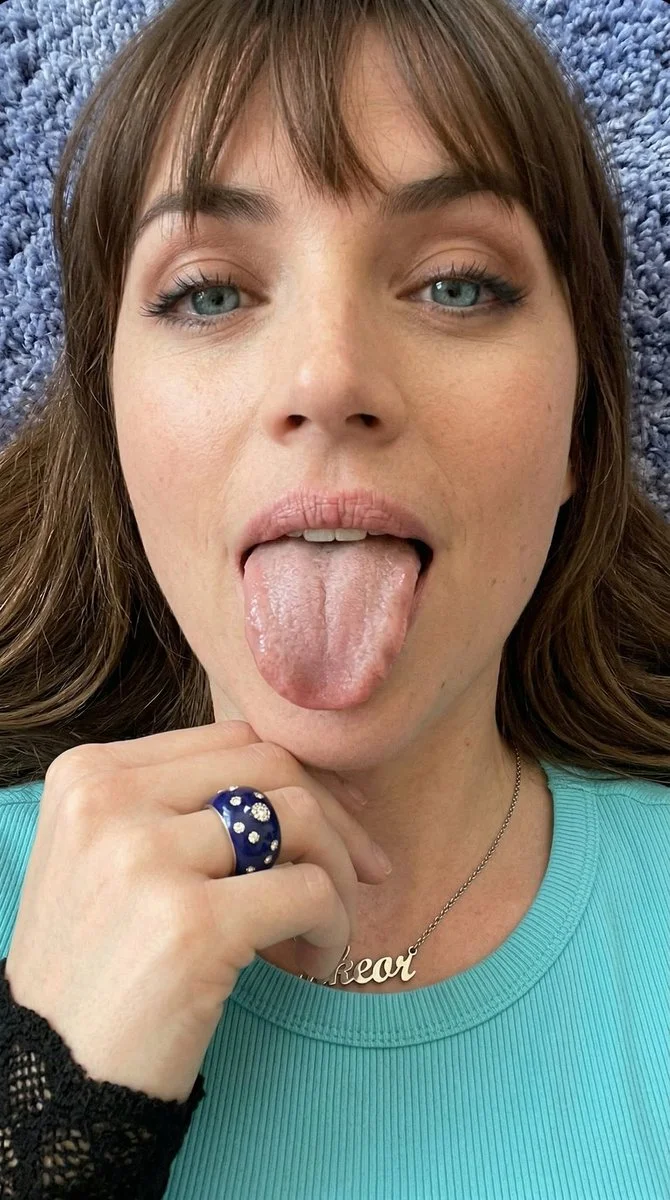 Intimate Tongue-Out Close-Up with Textured Skin and Hair Detail