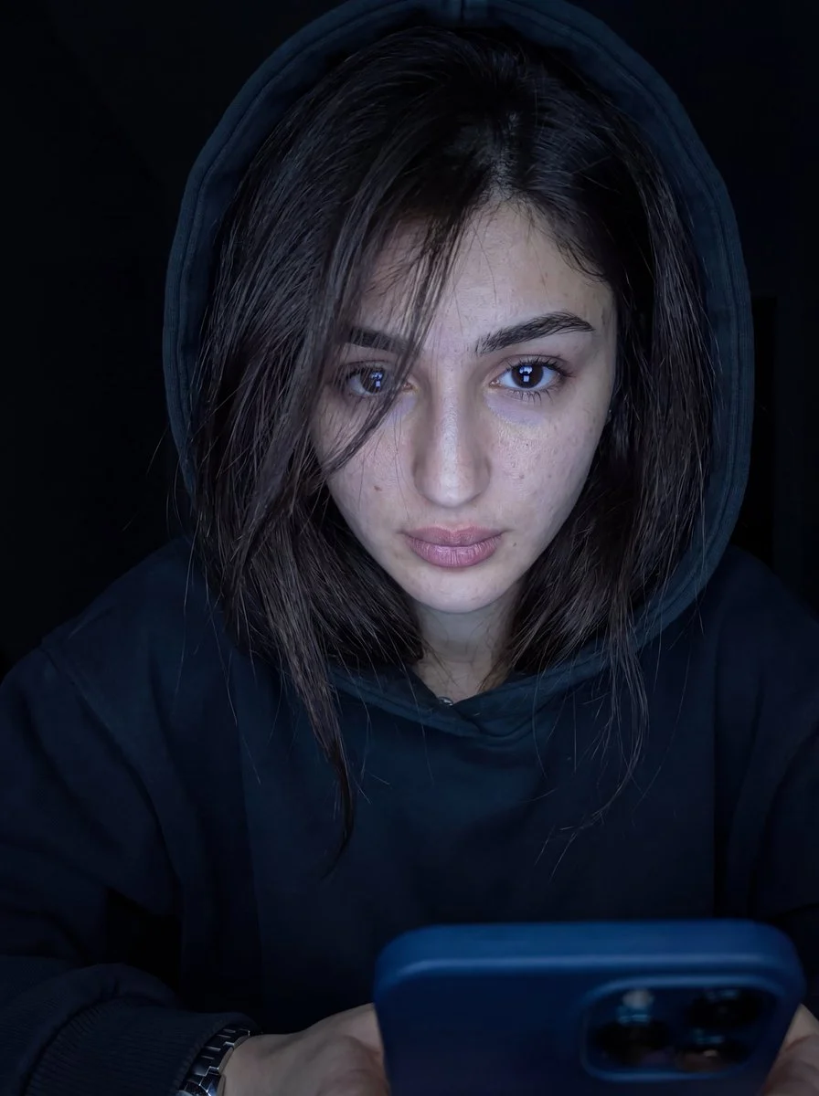 Luminous Gaze in Shadowed Hoodie