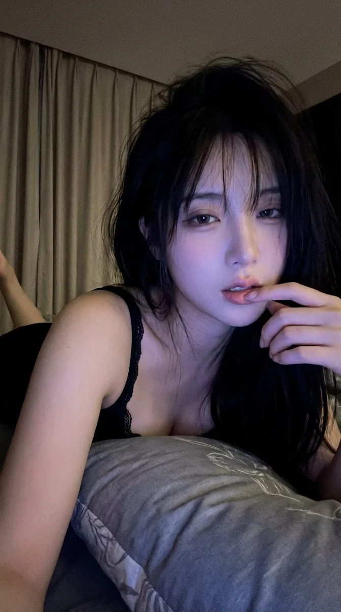 Midnight Allure: A Sultry Bedroom Portrait