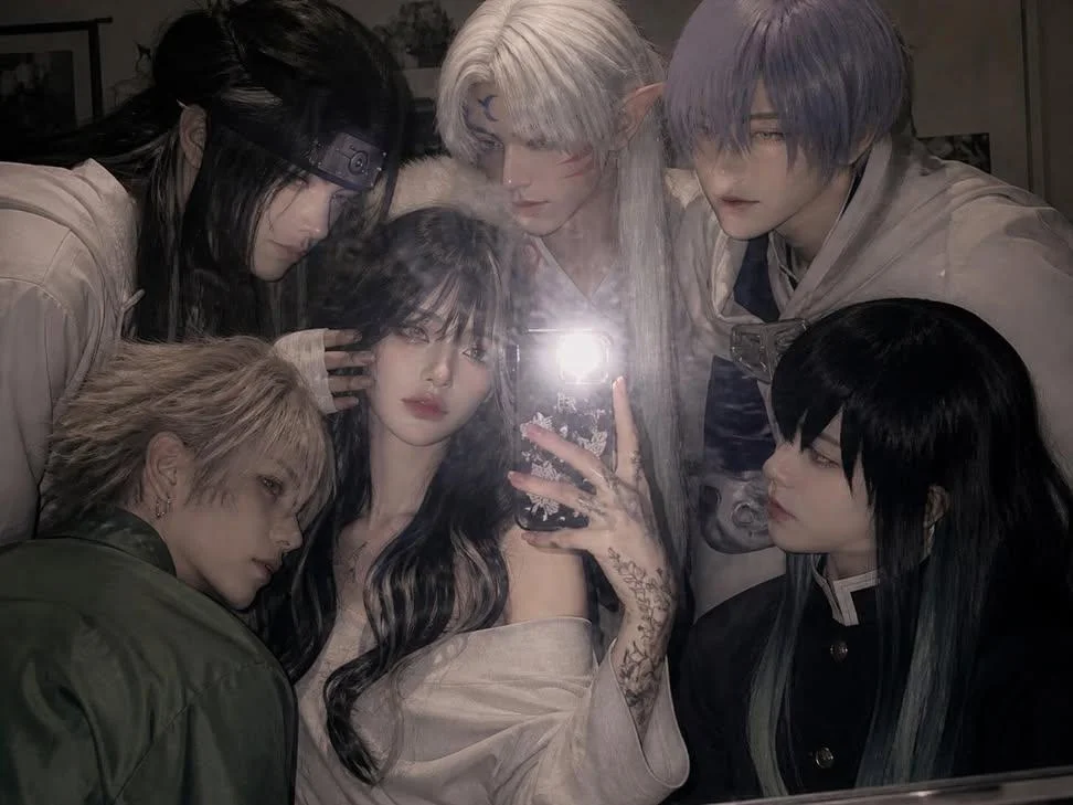 Mirror Selfie Surrounded by Cosplay Characters