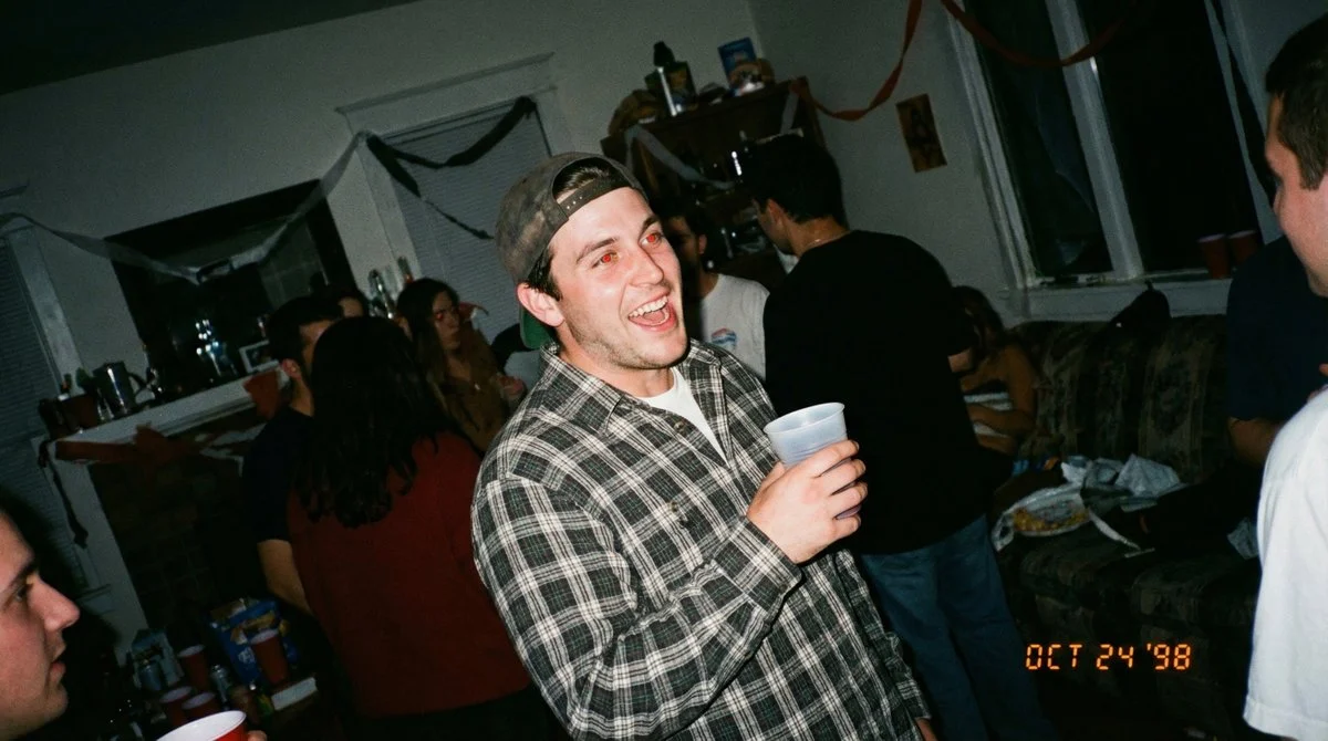 Nostalgia in Grain: A Chaotic 90s House Party Snapshot