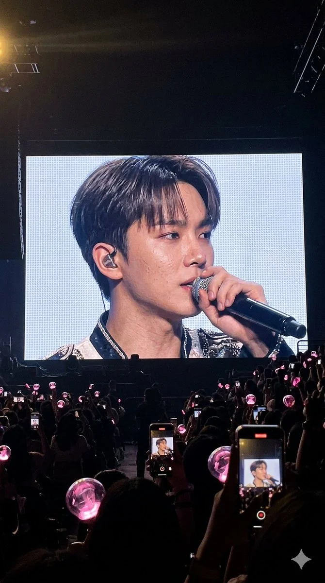 Passionate singer performs on massive Jumbotron screen for excited crowd