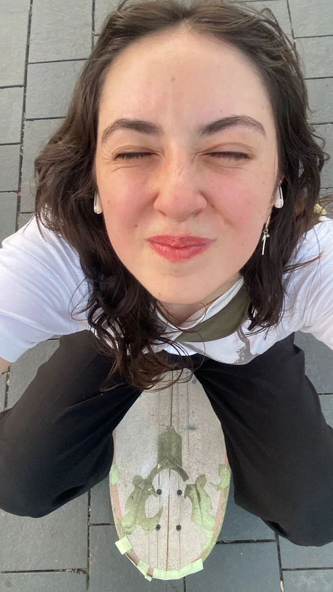 Playful Perspectives: A Skateboarder's Top-Down Smile