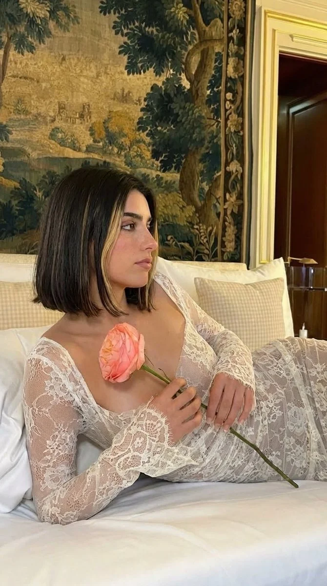 Quiet Luxury and Introspection in a Softly Lit Bedroom Scene