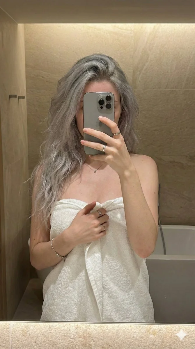 Reflective Radiance: A Bathroom Selfie Story