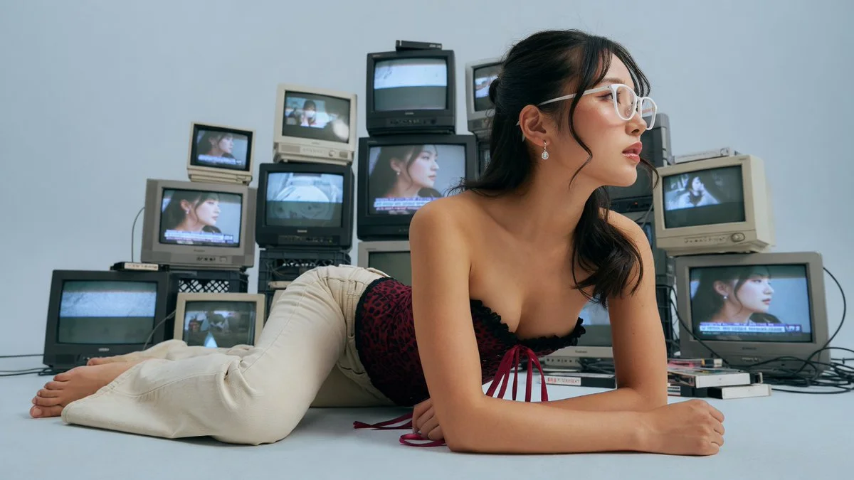 Retro TV cluster frames athletic woman in champagne jeans