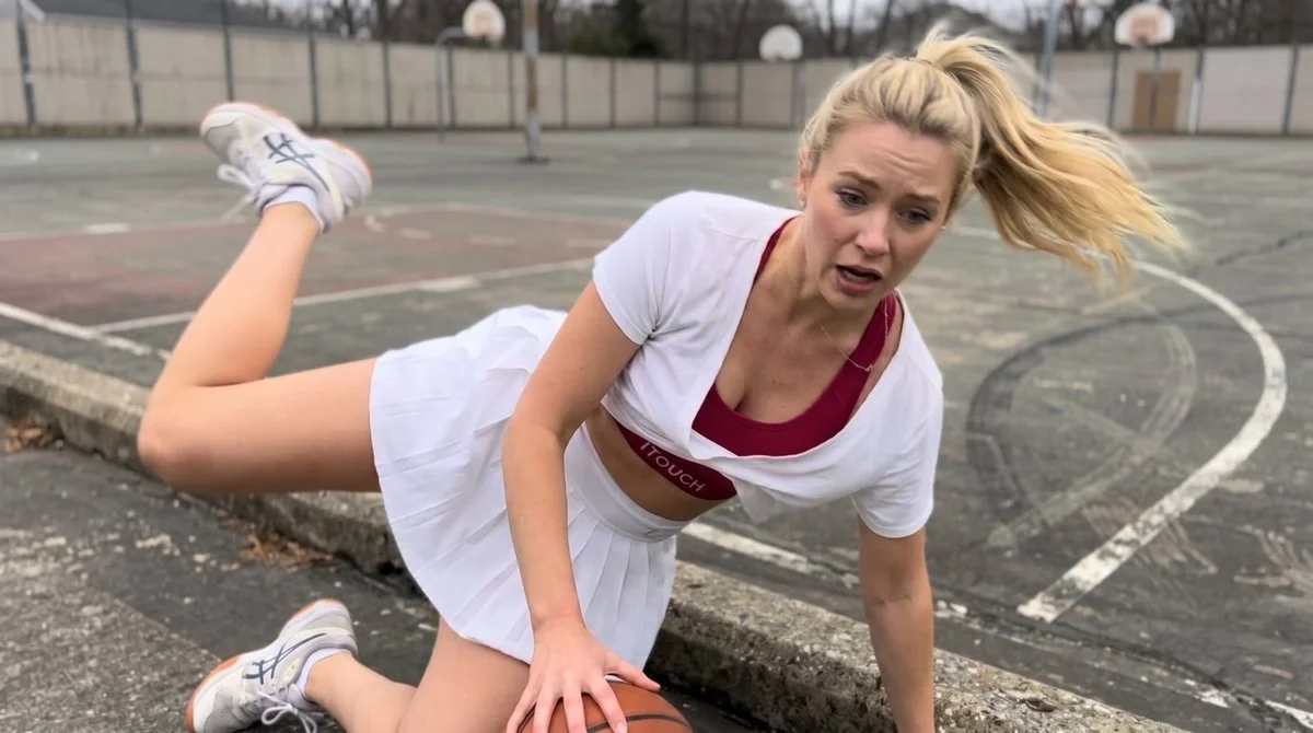 Scandinavian basketball player falls awkwardly onto the net during game