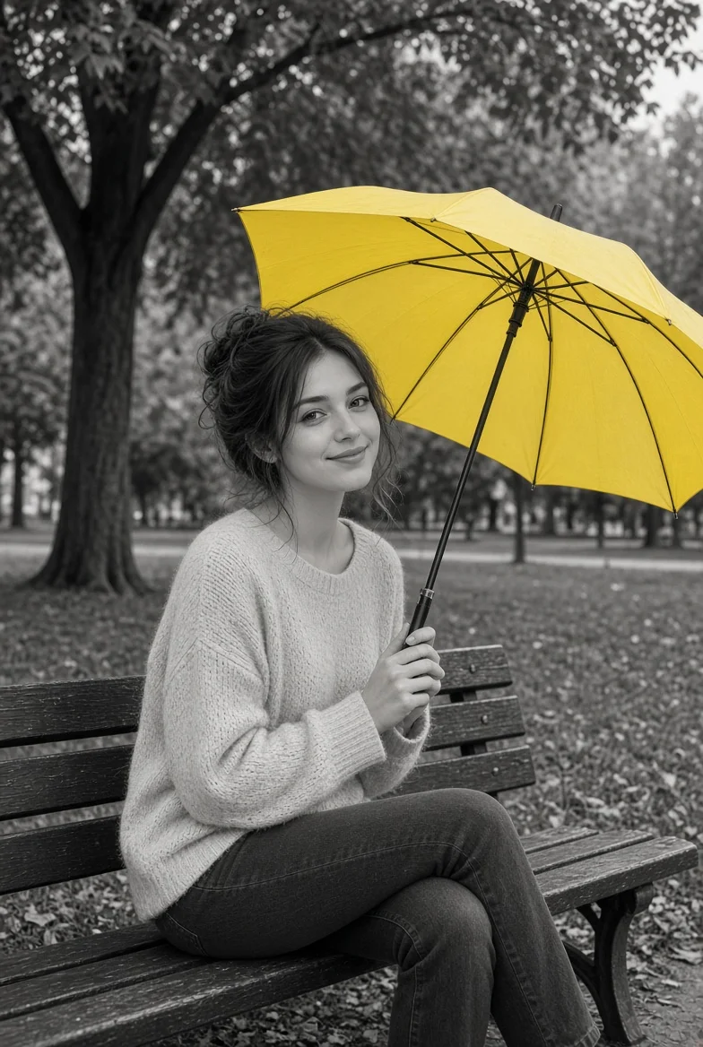 Smiling woman with yellow umbrella sits on park bench
