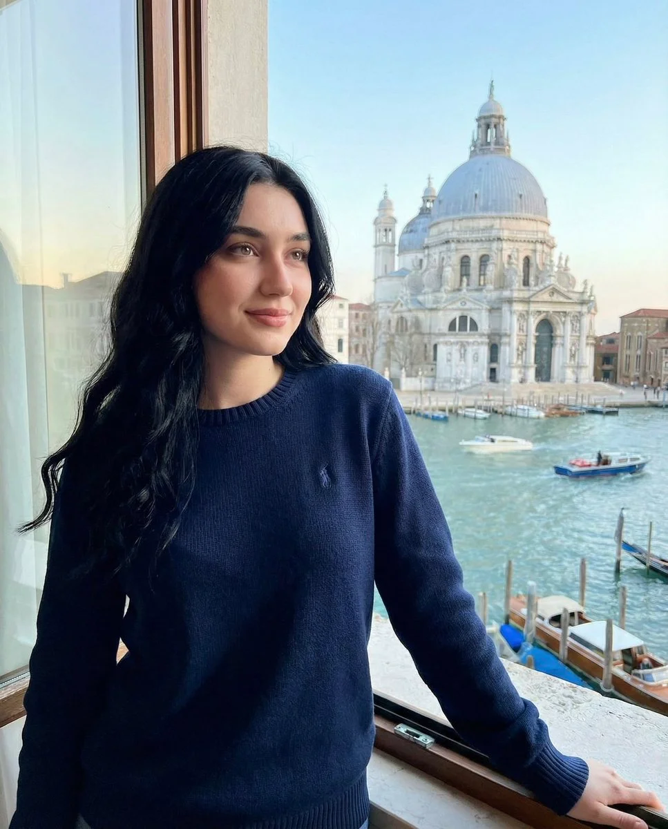 Soft Elegance by the Window: A Portrait of Serenity