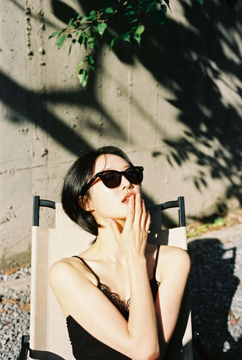 Subtle Confidence: Capturing a Poised Moment in Analog Film