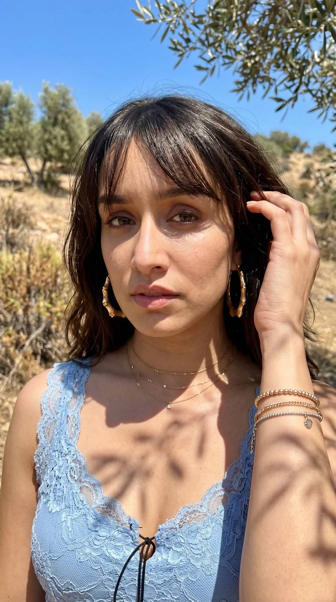 Sunlit Portrait of a Confident Young Woman with Natural Detail