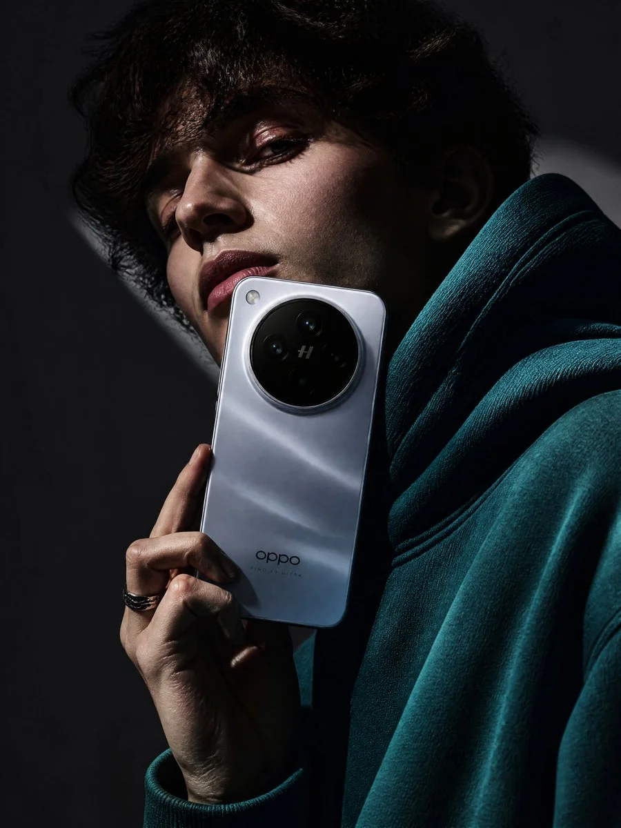 Teal Hoodie Meets Tech Elegance