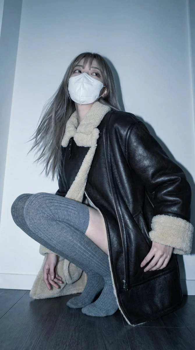 Urban Chic: A Moment of Stylish Detachment