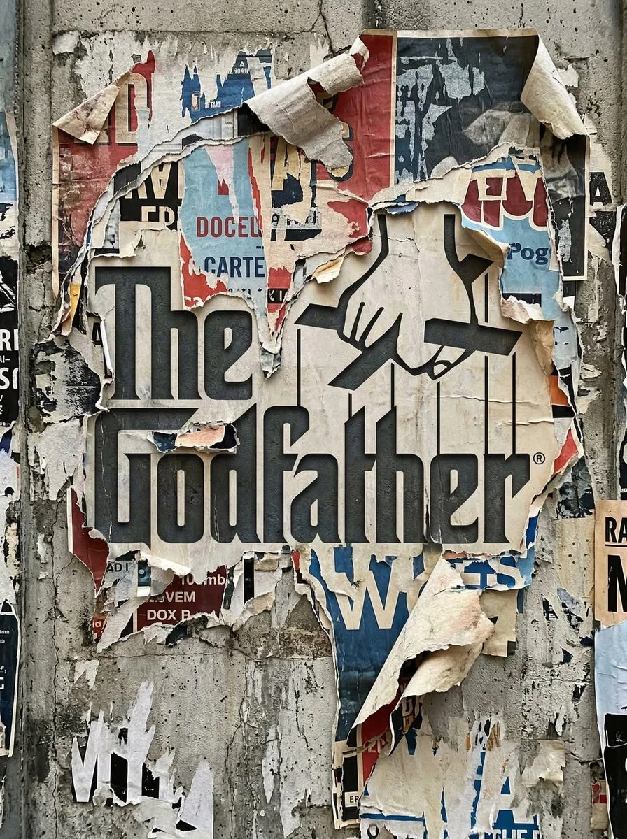 Urban Poster Decay Revealing Gemini Nano Banana Logo