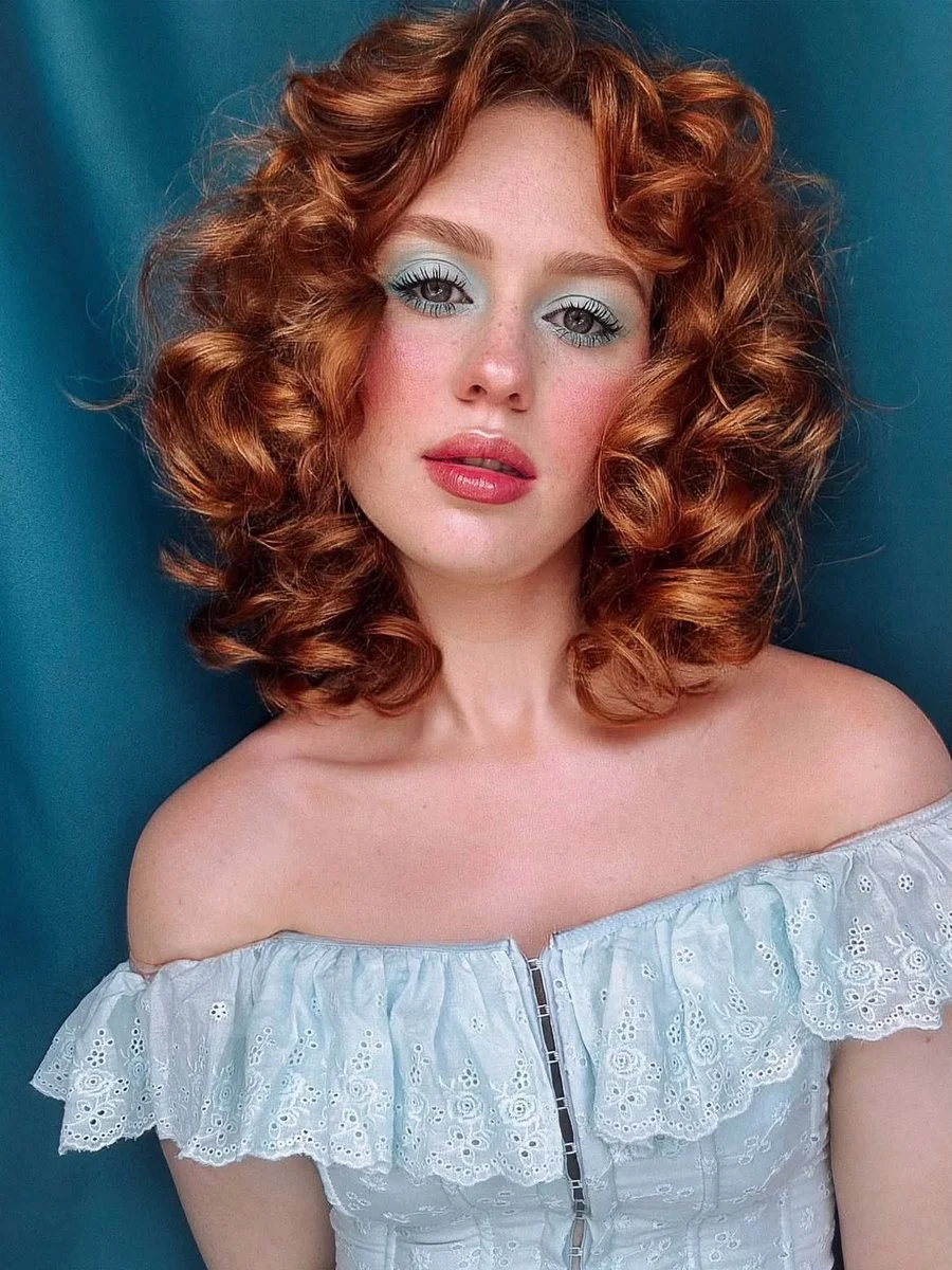 Whimsical hand-drawn portrait of ginger woman with celestial flowers
