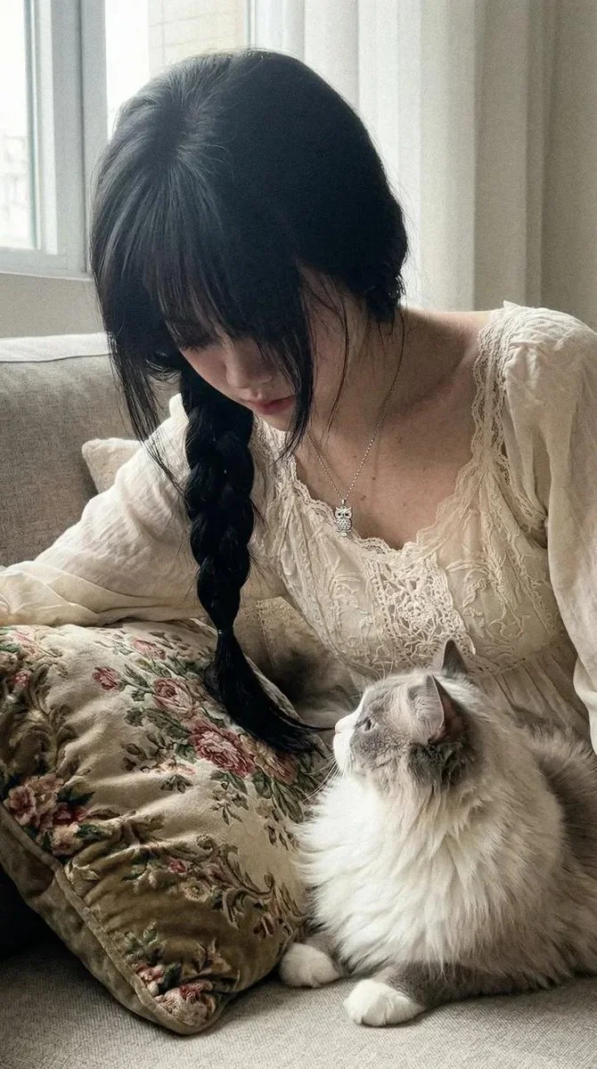 Whispers of Serenity: A Cozy Moment with Feline Companionship